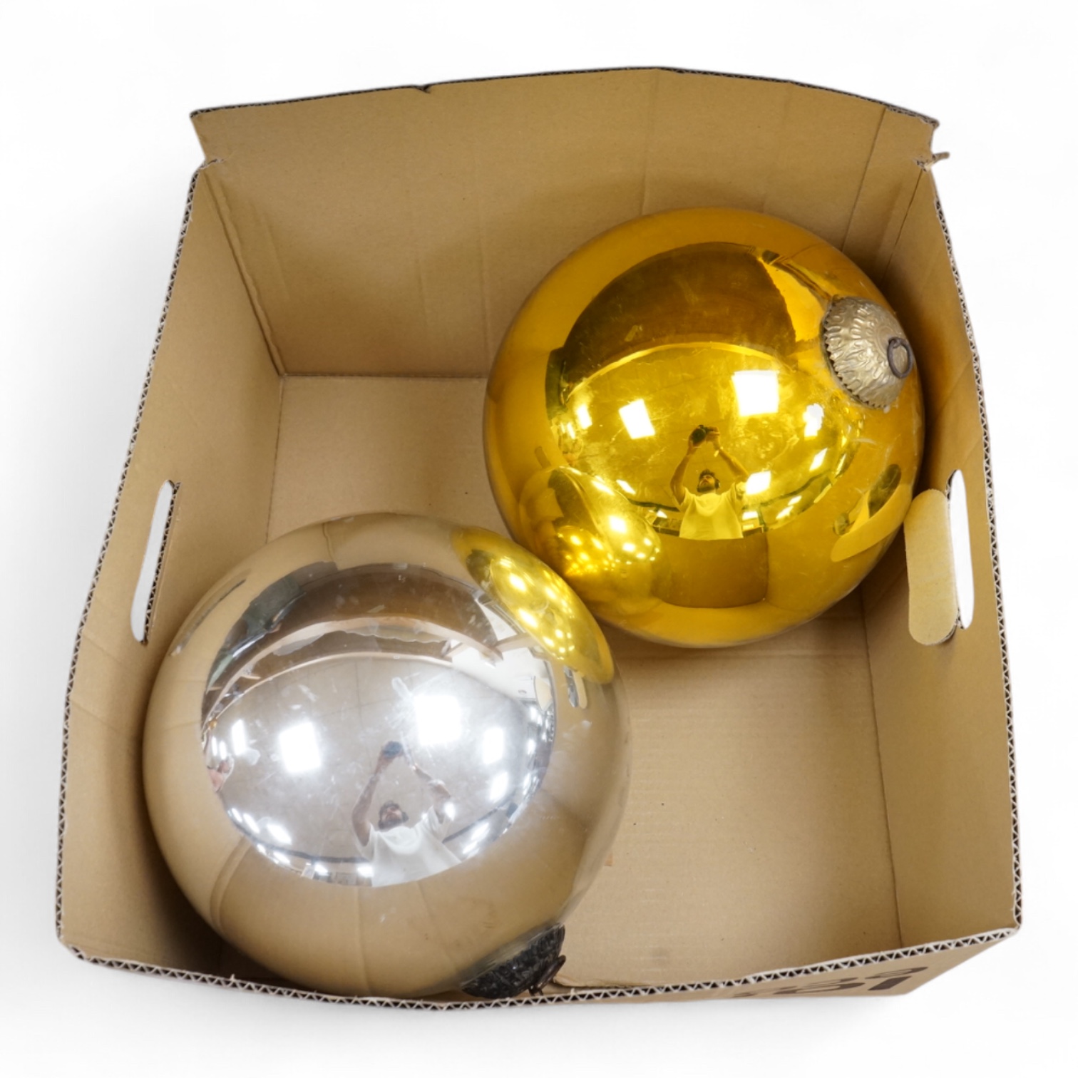Two large witches balls, one silver and one gold, circumference approx. 82cm